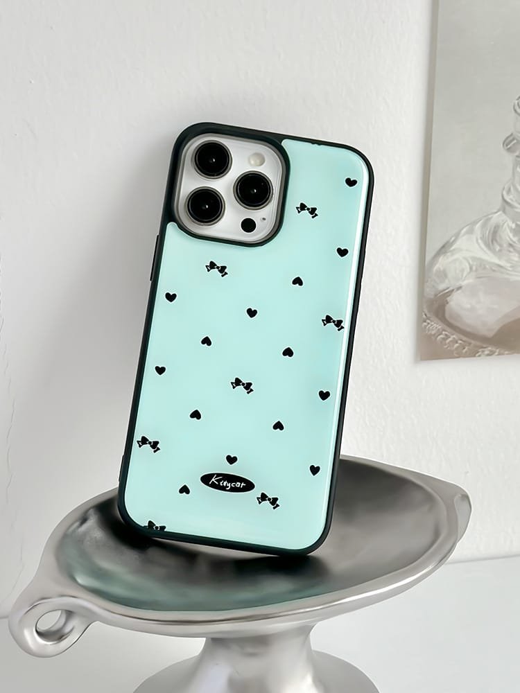 Love bows on light blue background phone case for Apple iPhone 16 Pro Max, featuring a romantic bow design on durable epoxy resin