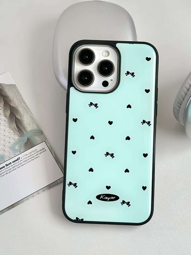 Love bows on light blue background phone case for Apple iPhone 16 Pro Max, featuring a romantic bow design on durable epoxy resin