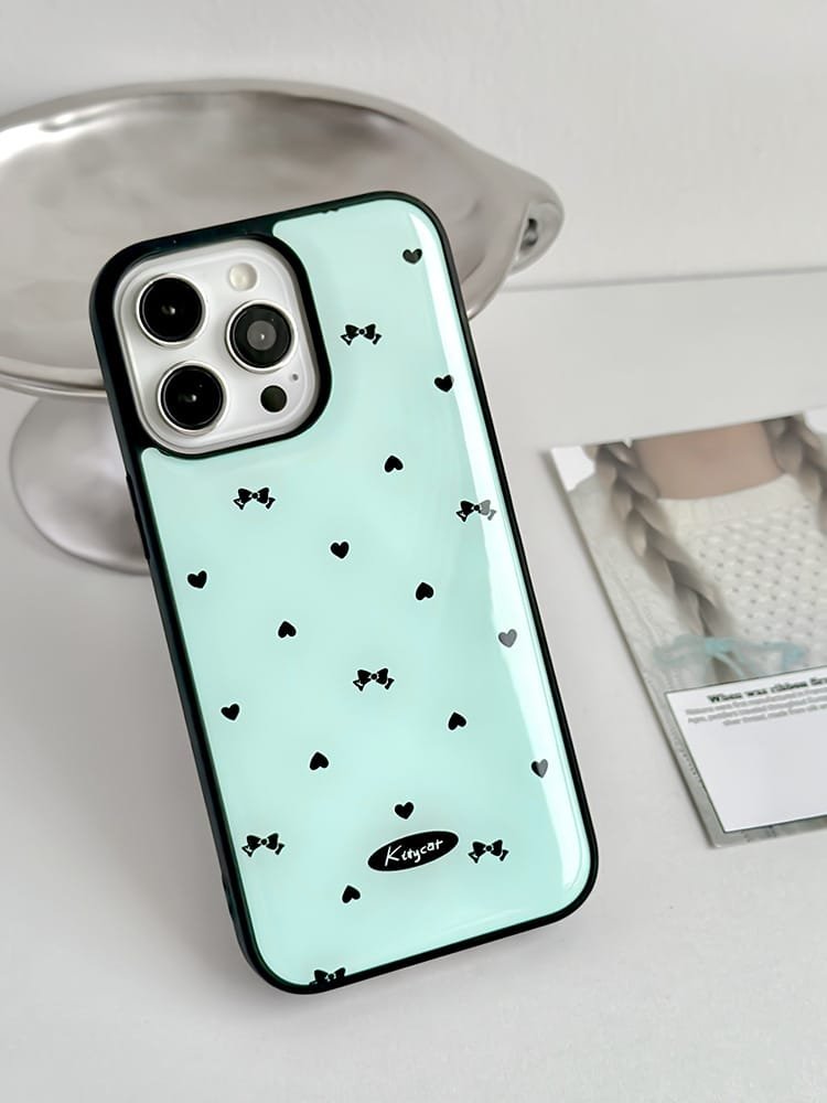 Love bows on light blue background phone case for Apple iPhone 16 Pro Max, featuring a romantic bow design on durable epoxy resin