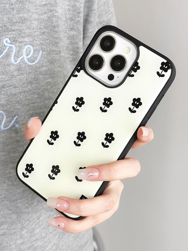 Black flowers all over the screen phone case for Apple iPhone 16 Pro Max, featuring an intricate floral design on durable epoxy resin